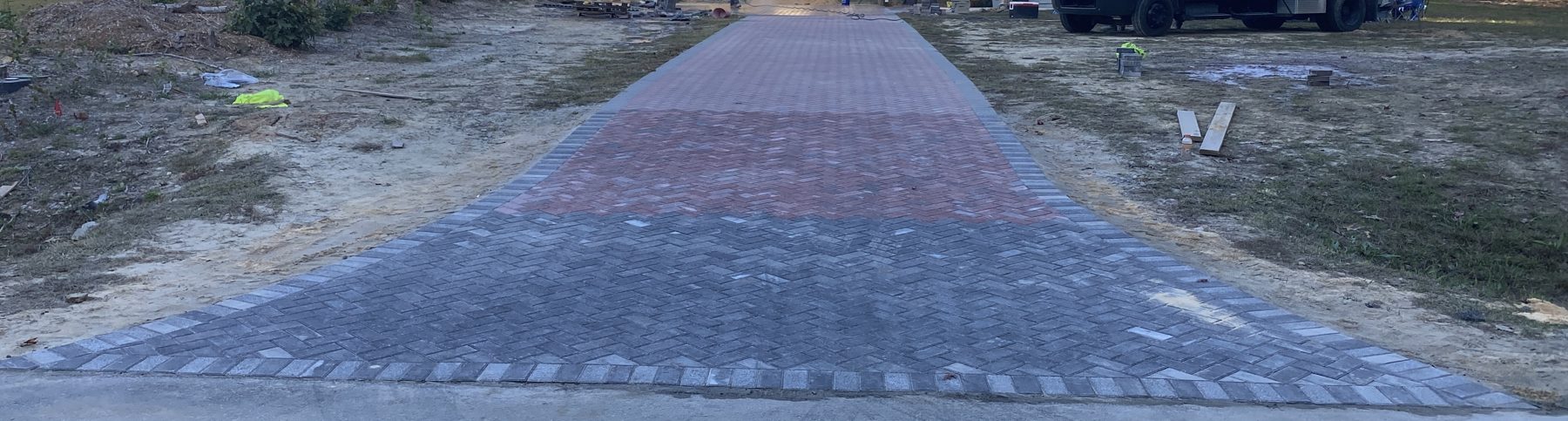 Brick paver driveway laid end to end, freshly finished