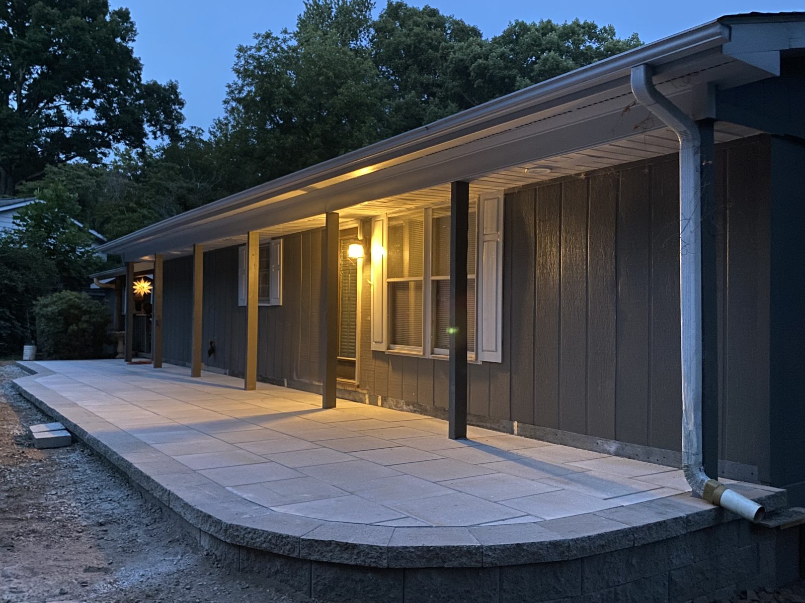 Paver walkway with low voltage lighting at dusk